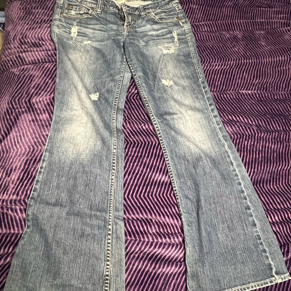 Silver Jeans Women's Light Blue Distressed Flare Jeans